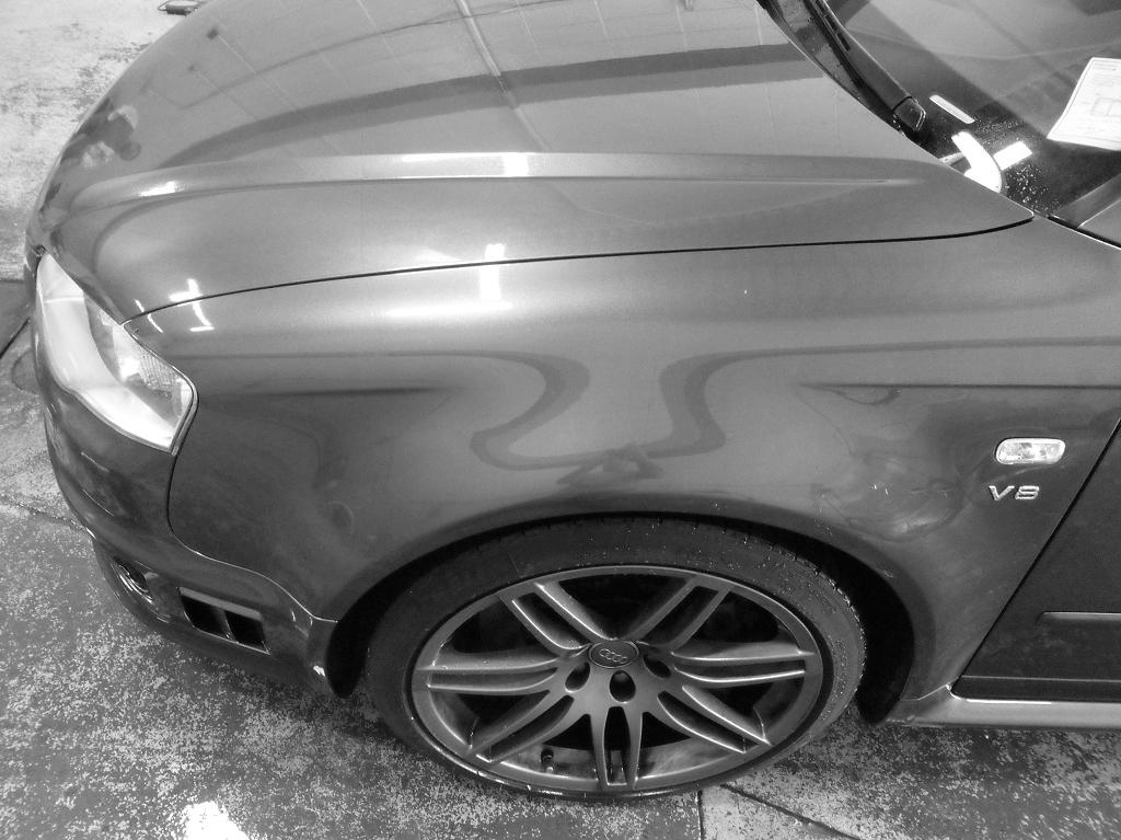 After image of dent repair on front quarter panel