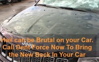 Vehicle with extreme hail damage on hood