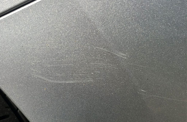 How much does paintless dent repair cost Photo PDR Dented